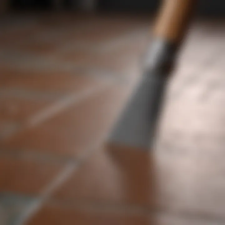 Close-up of a tile chisel demonstrating its intricate blade for lifting tiles