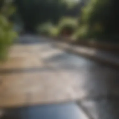 Close-up of water jet cleaning stone patio tiles