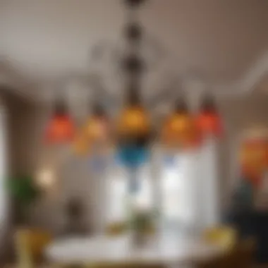 Close-up view of a unique chandelier with colorful glass elements illuminating a dining area.