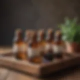 Aromatic essential oils in glass bottles on a wooden tray