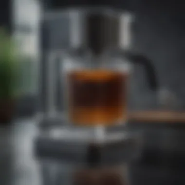 Elegant glass water reservoir of a coffee maker