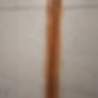 Before and after removal of rust stain from a bathroom tile