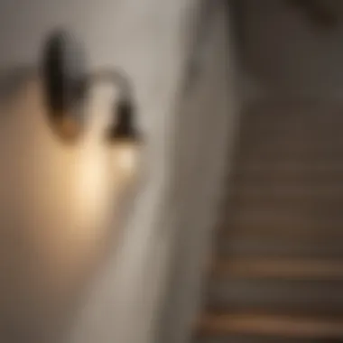 Chic wall sconces beside a staircase, adding warmth