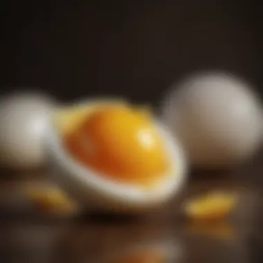 Sliced Hard Boiled Egg with Yolk Reveal Cut hard boiled egg showcasing yolk