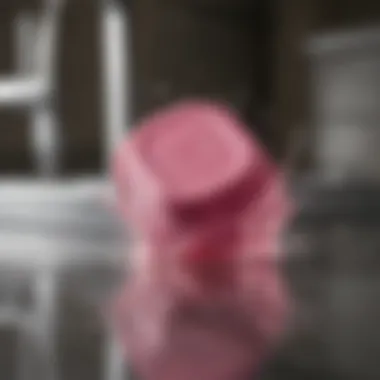 Pink Dishwasher Tablet Dissolving Effectively in Water