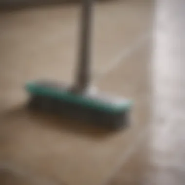 A meticulous cleaning brush working on grout lines